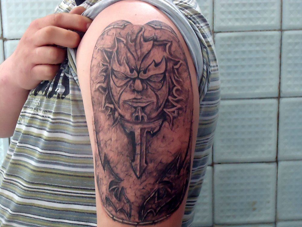 Славянская татуировка на локте для мужчин